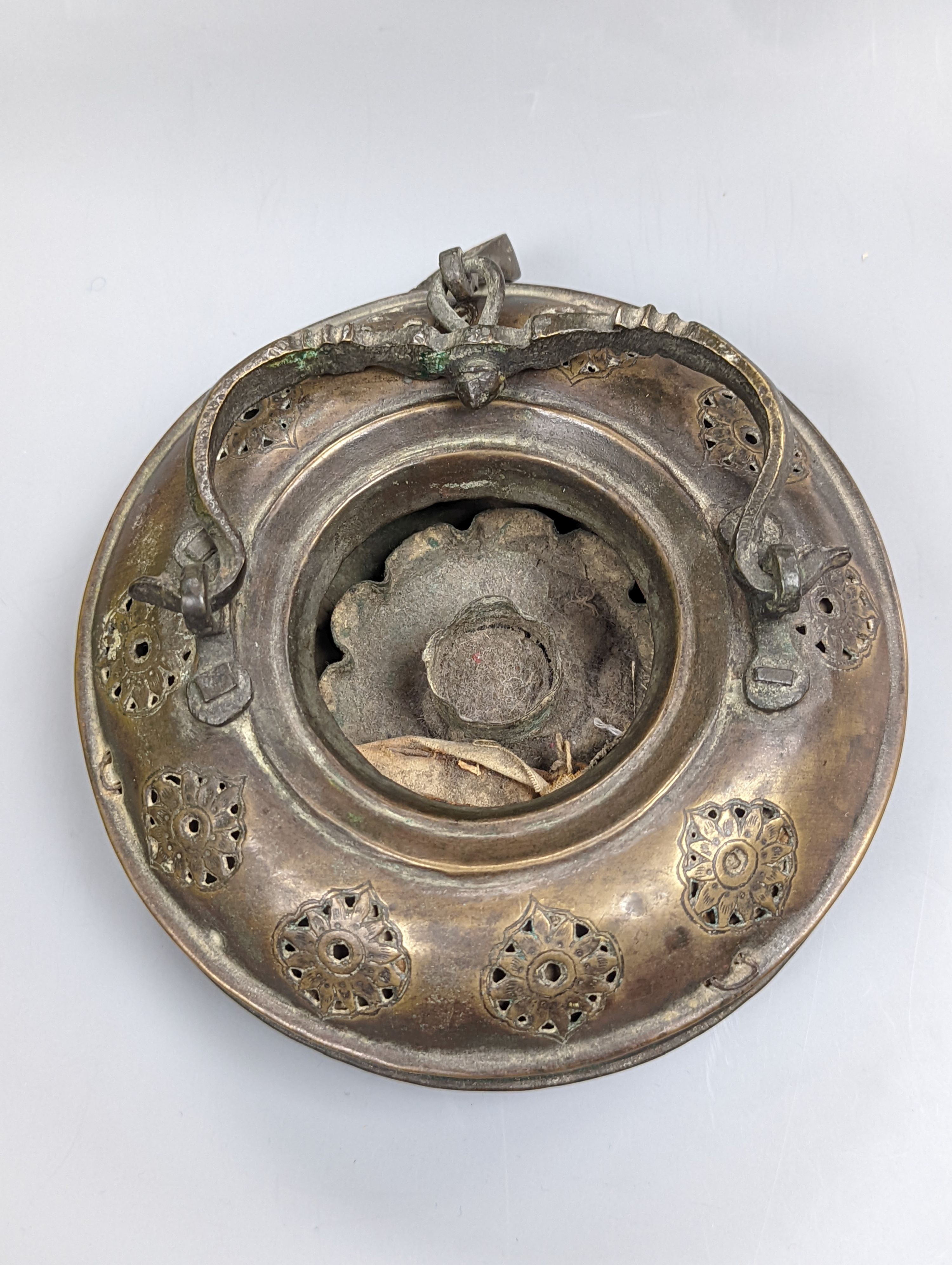 A Chinese bronze vase, 12cm., and an Islamic pierced brass lamp